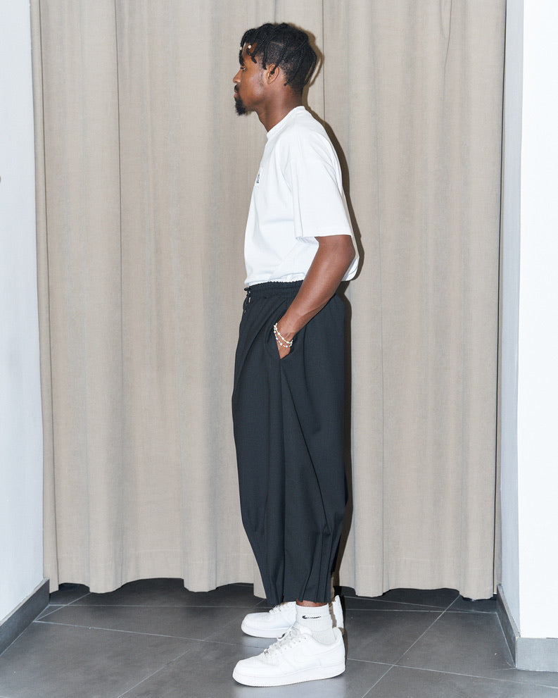 NCB - Deconstructed Knife Pleat Raw Hem Pants