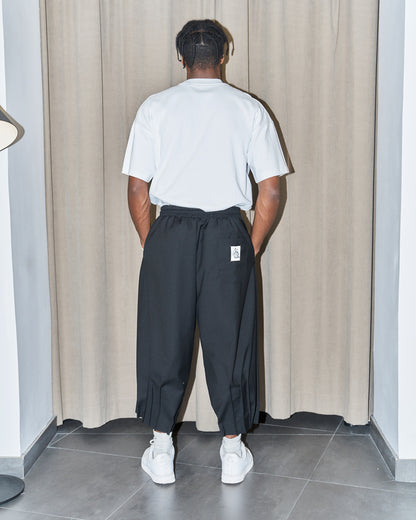 NCB - Deconstructed Knife Pleat Raw Hem Pants
