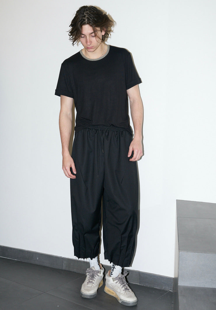 NCB - Deconstructed Knife Pleat Raw Hem Pants